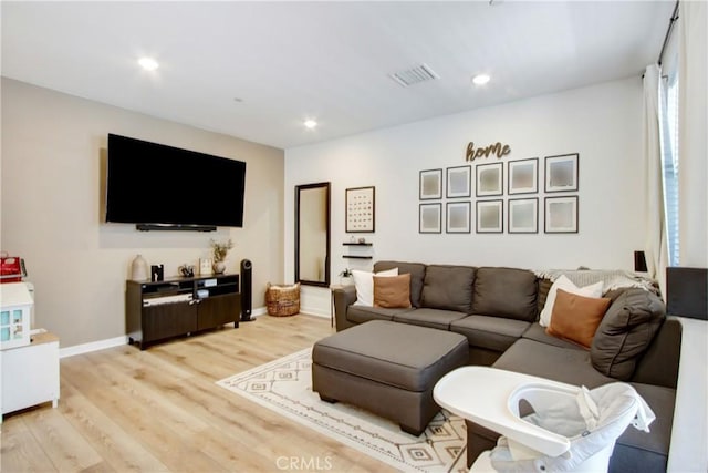 4085 E Liliana Paseo Unit 69, Ontario, CA 91764 - living room featuring light wood-type flooring, recessed lighting, and baseboards