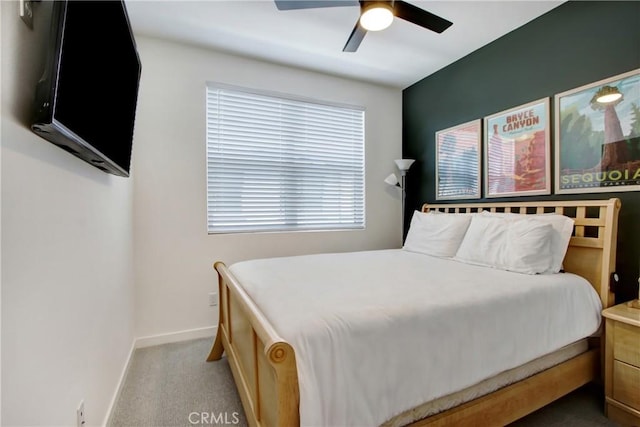 4085 E Liliana Paseo Unit 69, Ontario, CA 91764 - bedroom featuring light colored carpet, baseboards, and a ceiling fan