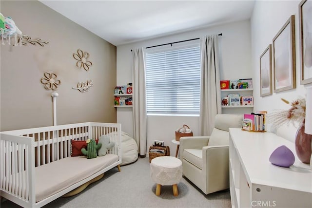 4085 E Liliana Paseo Unit 69, Ontario, CA 91764 - bedroom with a nursery area and light carpet