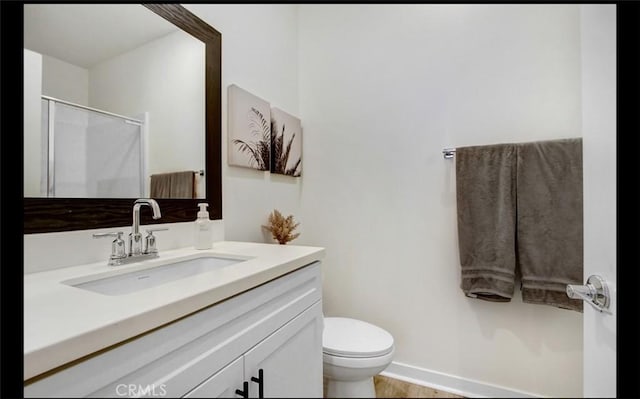 4085 E Liliana Paseo Unit 69, Ontario, CA 91764 - bathroom featuring vanity, an enclosed shower, and wood finished floors