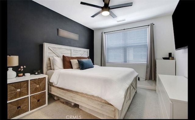 4085 E Liliana Paseo Unit 69, Ontario, CA 91764 - bedroom with light colored carpet and ceiling fan