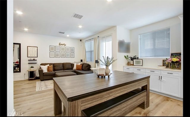 4085 E Liliana Paseo Unit 69, Ontario, CA 91764 - living area featuring light wood finished floors and recessed lighting