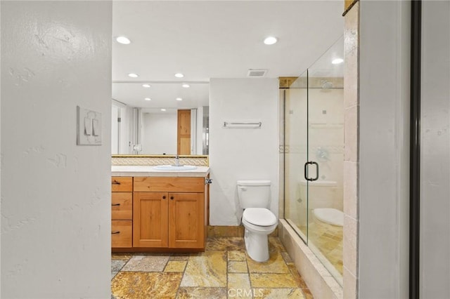 1750 E Ocean Blvd Unit 511, Long Beach, CA 90802 - full bath with toilet, a stall shower, stone tile flooring, vanity, and recessed lighting