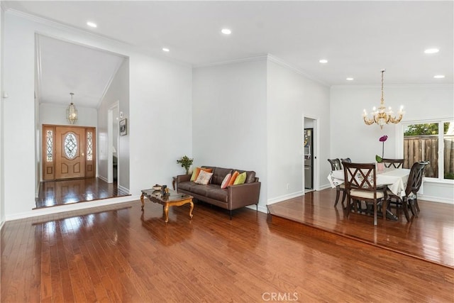 18 Blazing Star, Irvine, CA 92604 - living room with hardwood / wood-style floors, a chandelier, recessed lighting, baseboards, and ornamental molding