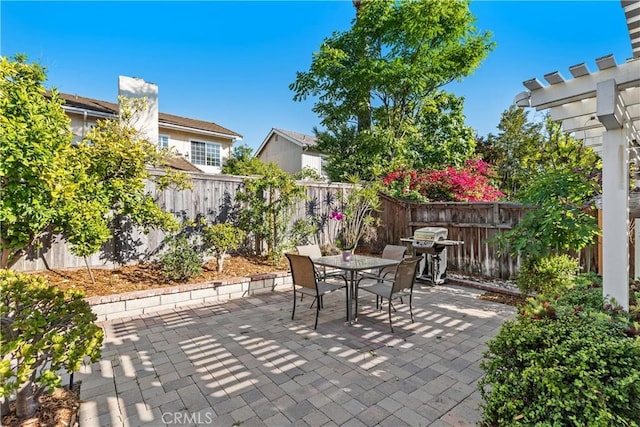18 Blazing Star, Irvine, CA 92604 - view of patio featuring outdoor dining space, a fenced backyard, and a grill