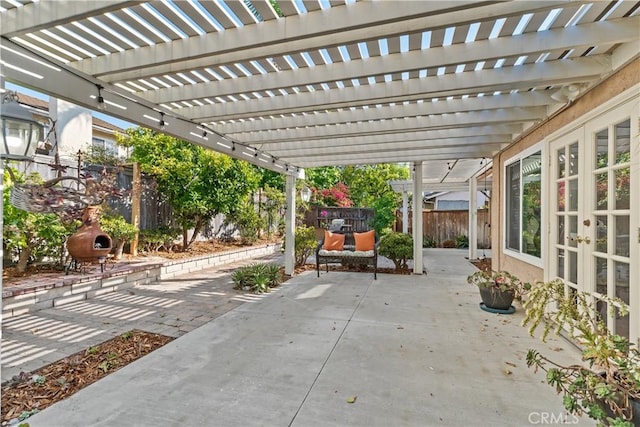 18 Blazing Star, Irvine, CA 92604 - view of patio with a fenced backyard, a pergola, and french doors