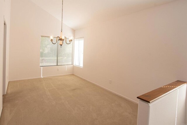 2432 Live Oak Rd, Escondido, CA 92029 - empty room with a chandelier, light colored carpet, baseboards, and vaulted ceiling