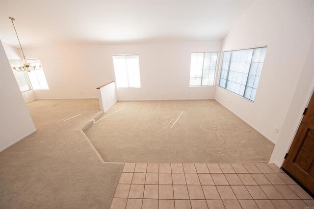 2432 Live Oak Rd, Escondido, CA 92029 - spare room with light carpet, a chandelier, and baseboards