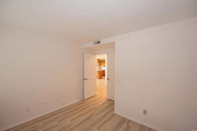 2432 Live Oak Rd, Escondido, CA 92029 - unfurnished room featuring baseboards and light wood finished floors