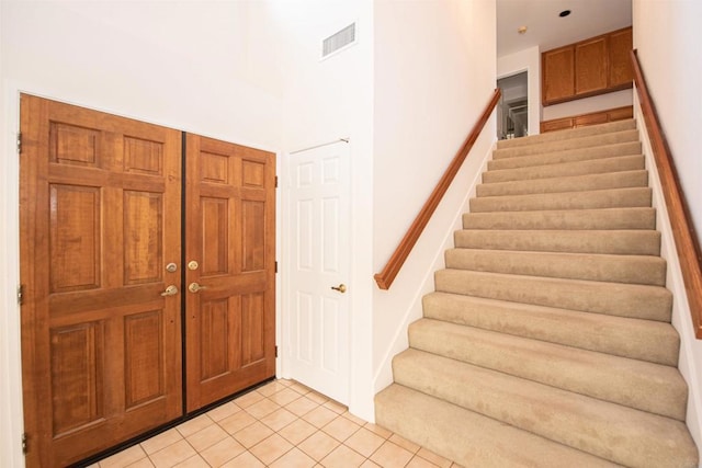 2432 Live Oak Rd, Escondido, CA 92029 - entrance foyer featuring light tile patterned floors and stairway