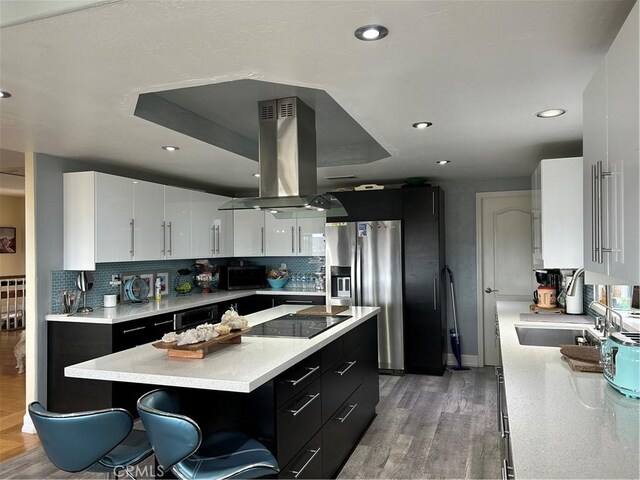 28856 Yosemite Pl, Canyon Lake, CA 92587 - kitchen featuring black appliances, dark cabinetry, a sink, backsplash, and recessed lighting
