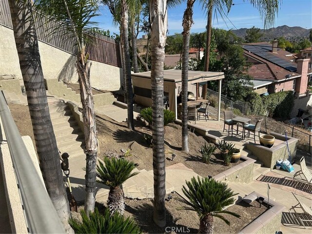 28856 Yosemite Pl, Canyon Lake, CA 92587 - view of yard featuring stairway, a patio, and a mountain view