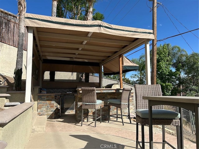 28856 Yosemite Pl, Canyon Lake, CA 92587 - view of patio / terrace featuring exterior kitchen