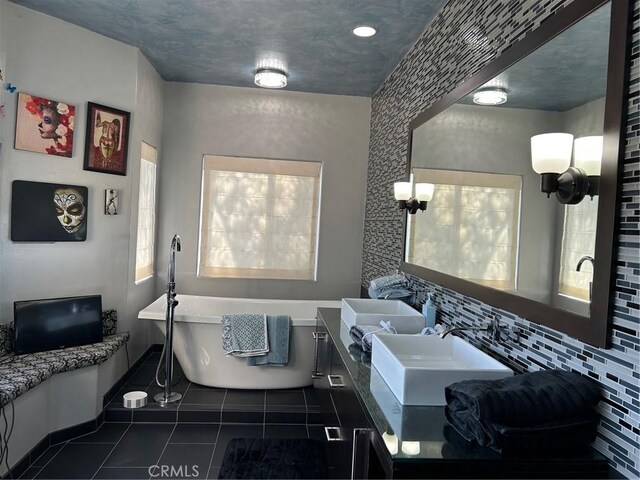 28856 Yosemite Pl, Canyon Lake, CA 92587 - full bathroom featuring tile patterned flooring, a freestanding bath, healthy amount of natural light, and double vanity