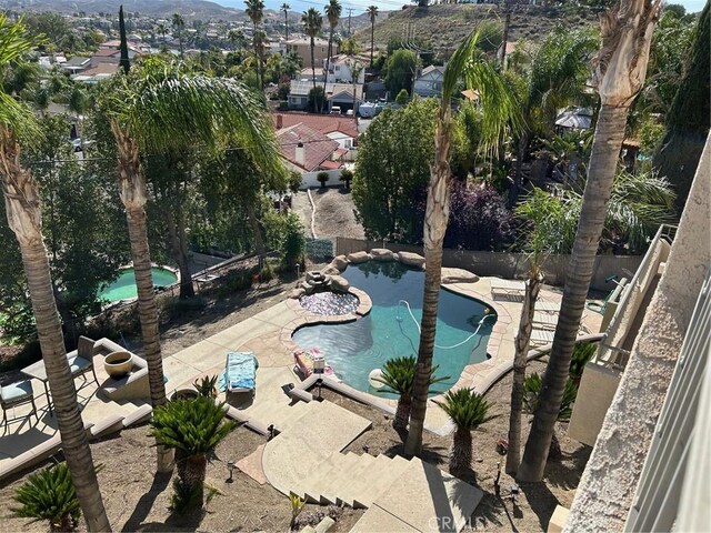 28856 Yosemite Pl, Canyon Lake, CA 92587 - view of swimming pool with a patio