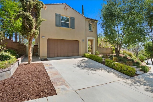 5176 Glenview St, Chino Hills, CA 91709 - mediterranean / spanish house featuring driveway, stucco siding, a garage, and fence