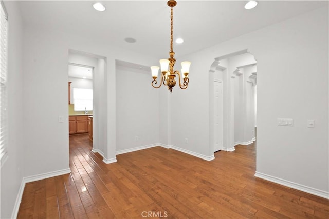 5176 Glenview St, Chino Hills, CA 91709 - empty room with a chandelier, wood-type flooring, baseboards, and recessed lighting