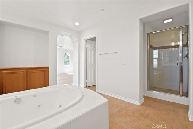 5176 Glenview St, Chino Hills, CA 91709 - bathroom with a jetted tub, a stall shower, baseboards, tile patterned floors, and recessed lighting
