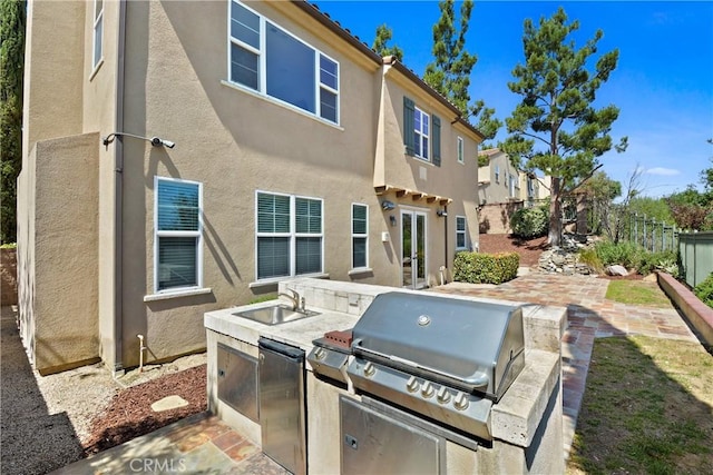 5176 Glenview St, Chino Hills, CA 91709 - view of patio / terrace with a sink, grilling area, a fenced backyard, an outdoor kitchen, and a residential view