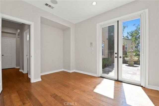 5176 Glenview St, Chino Hills, CA 91709 - unfurnished room featuring french doors, wood finished floors, baseboards, and recessed lighting