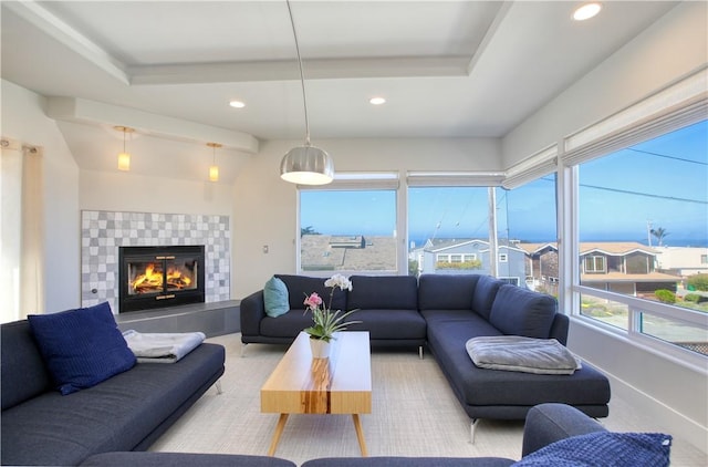 1850 Laurel Pl, Cambria, CA 93428 - living room with recessed lighting, a fireplace, a tray ceiling, carpet, and baseboards