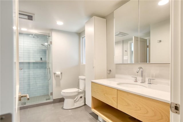 1850 Laurel Pl, Cambria, CA 93428 - bathroom featuring vanity, a stall shower, toilet, tile patterned floors, and recessed lighting