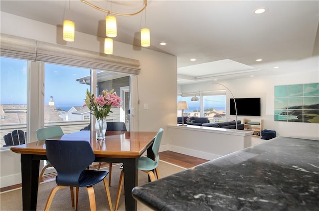1850 Laurel Pl, Cambria, CA 93428 - dining space featuring baseboards, recessed lighting, a raised ceiling, and wood finished floors
