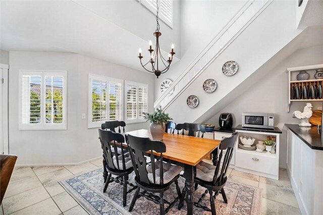 69 Cloudcrest, Aliso Viejo, CA 92656 - dining room featuring a chandelier and baseboards