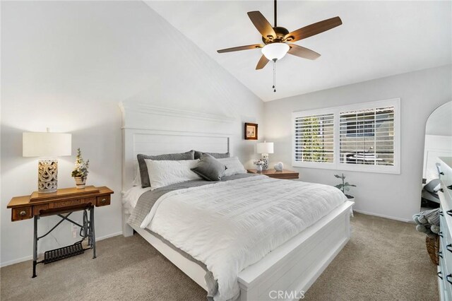 69 Cloudcrest, Aliso Viejo, CA 92656 - bedroom with light colored carpet, baseboards, ceiling fan, and vaulted ceiling
