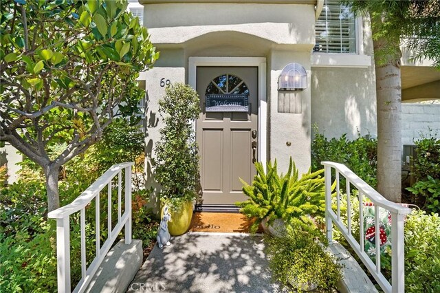 69 Cloudcrest, Aliso Viejo, CA 92656 - view of exterior entry featuring stucco siding