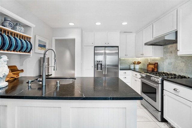 69 Cloudcrest, Aliso Viejo, CA 92656 - kitchen with appliances with stainless steel finishes, under cabinet range hood, white cabinets, a sink, and open shelves