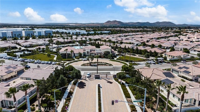 4699 S Moneta Privado, Ontario, CA 91761 - aerial overview of property's location featuring nearby suburban area and mountains
