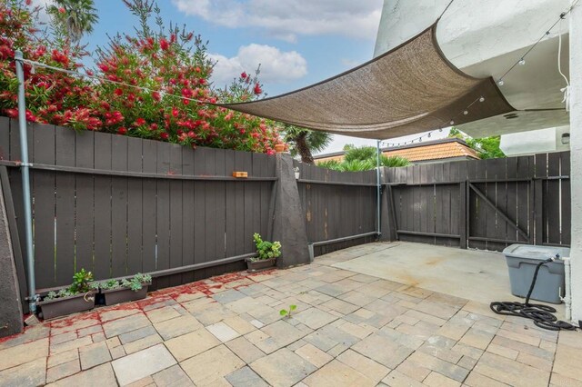2929 Fire Mountain Dr Unit 9, Oceanside, CA 92054 - view of patio / terrace with fence