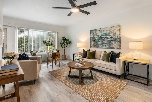 2929 Fire Mountain Dr Unit 9, Oceanside, CA 92054 - living area with ceiling fan, wood finished floors, and baseboards