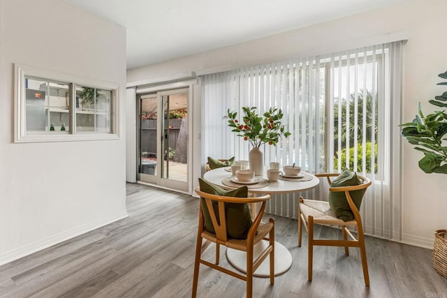 2929 Fire Mountain Dr Unit 9, Oceanside, CA 92054 - dining space featuring wood finished floors and baseboards