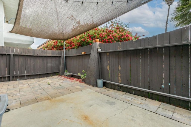 2929 Fire Mountain Dr Unit 9, Oceanside, CA 92054 - view of patio with a fenced backyard