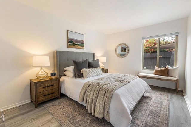 2929 Fire Mountain Dr Unit 9, Oceanside, CA 92054 - bedroom with wood finished floors and baseboards