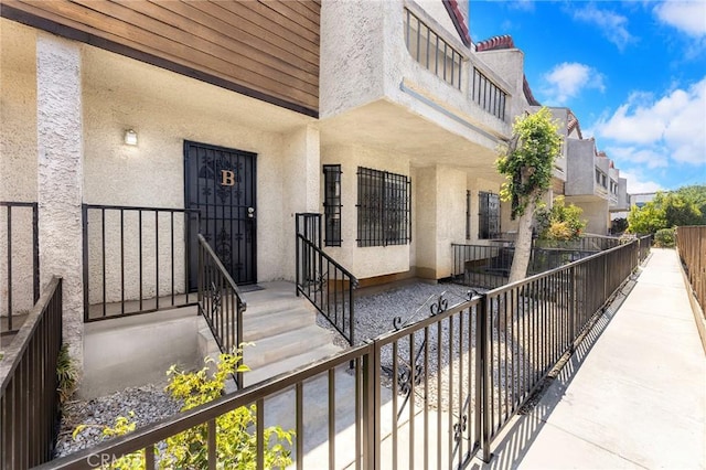 321 N Lincoln Ave Unit B, Monterey Park, CA 91755 - doorway to property featuring stucco siding
