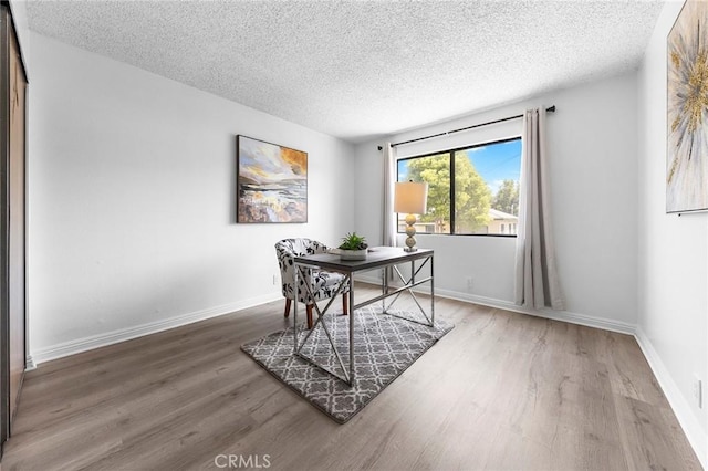 321 N Lincoln Ave Unit B, Monterey Park, CA 91755 - office area featuring wood finished floors and a textured ceiling