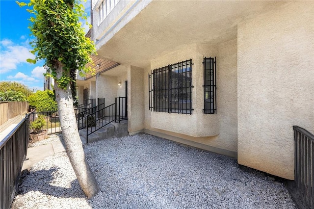 321 N Lincoln Ave Unit B, Monterey Park, CA 91755 - view of side of home featuring stucco siding