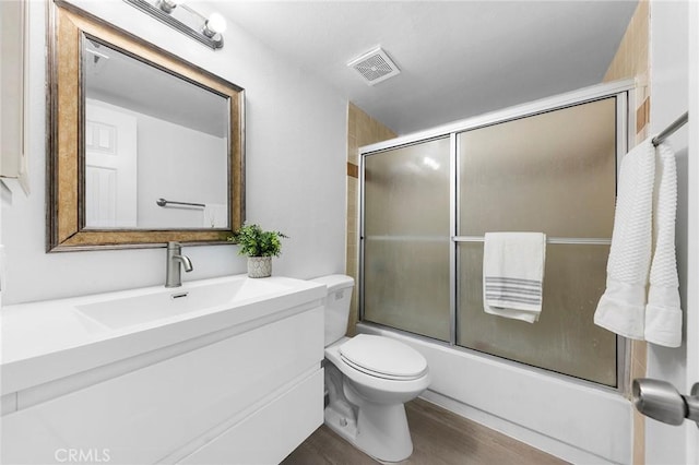 321 N Lincoln Ave Unit B, Monterey Park, CA 91755 - full bath with vanity, enclosed tub / shower combo, and wood finished floors