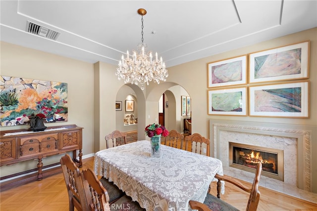 3805 Vista Azul, San Clemente, CA 92672 - dining area with arched walkways, baseboards, and a high end fireplace