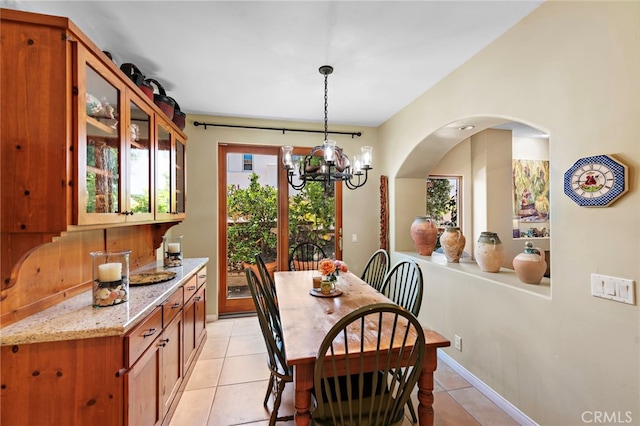 3805 Vista Azul, San Clemente, CA 92672 - dining room featuring a chandelier, light tile patterned flooring, and arched walkways