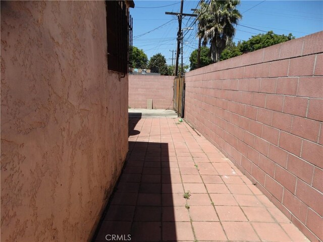 view of patio with fence