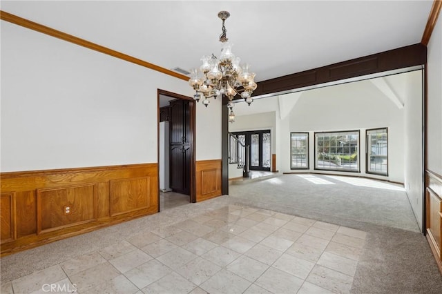 3808 E Summitridge Ln, Orange, CA 92867 - spare room featuring a chandelier, light carpet, and a wainscoted wall