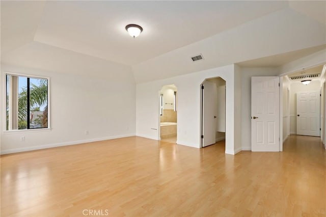 3808 E Summitridge Ln, Orange, CA 92867 - unfurnished room with arched walkways, light wood-type flooring, and baseboards