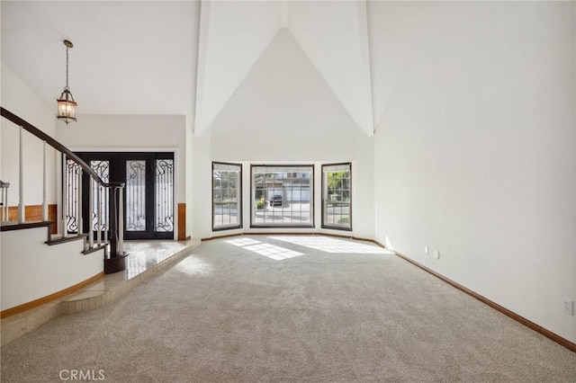 3808 E Summitridge Ln, Orange, CA 92867 - entryway featuring carpet, high vaulted ceiling, stairs, and baseboards
