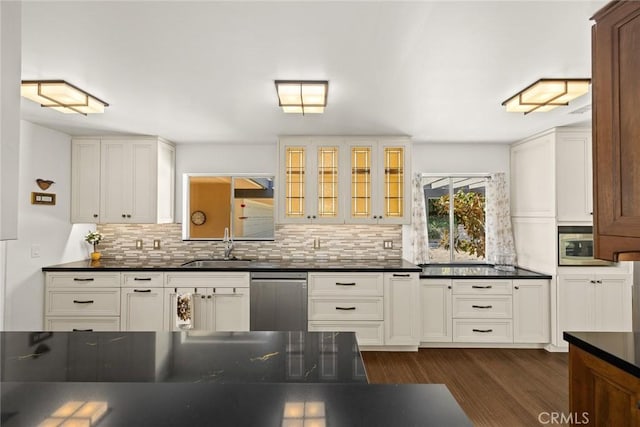 152 Spinks Canyon Rd, Bradbury, CA 91008 - kitchen featuring appliances with stainless steel finishes, dark countertops, tasteful backsplash, and glass insert cabinets