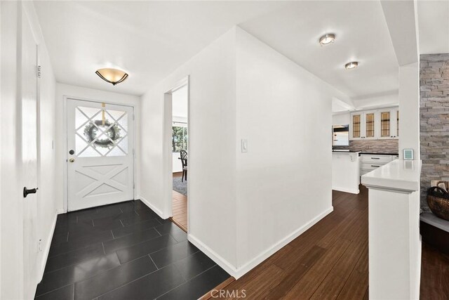 152 Spinks Canyon Rd, Bradbury, CA 91008 - foyer entrance with baseboards and dark wood finished floors
