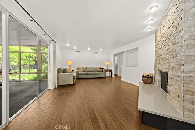 152 Spinks Canyon Rd, Bradbury, CA 91008 - living room featuring wood finished floors and a stone fireplace